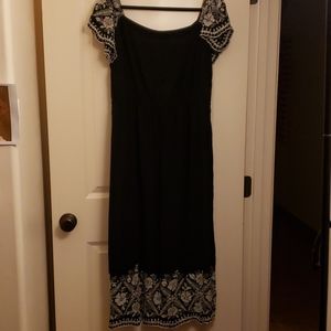 Long black dress with embroidered detail